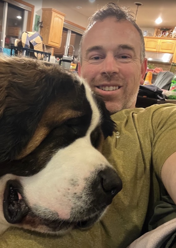 Andrew and Doug, nose to nose in the kitchen